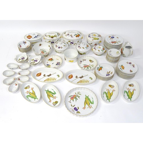 876 - A large quantity of Royal Worcester dinner wares in the Evesham pattern to include plates, tureens, ... 