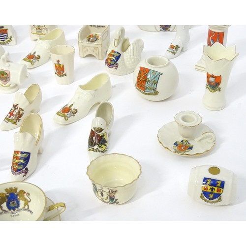 879 - A quantity of crested ware, to include Aylesbury, Norwich, London, Burton-on-Trent, Worcester, Peter... 