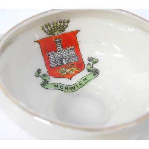 879 - A quantity of crested ware, to include Aylesbury, Norwich, London, Burton-on-Trent, Worcester, Peter... 