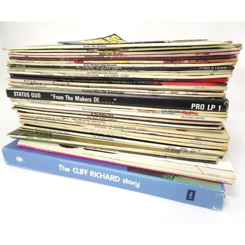 883 - A quantity of 33rpm vinyl records / LPs, albums to include: The Beatles Please Please Me (1963 Parlo... 