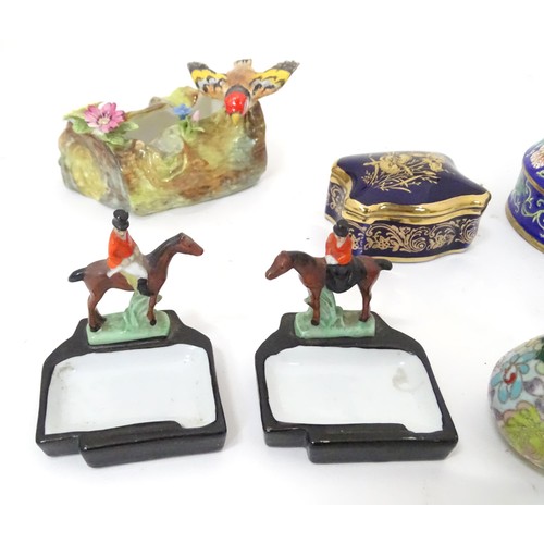 908 - Assorted items to include a pair of ceramic hunting themed pin dishes, a Limoge box, two match keeps... 