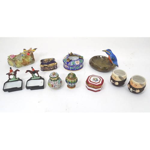 908 - Assorted items to include a pair of ceramic hunting themed pin dishes, a Limoge box, two match keeps... 