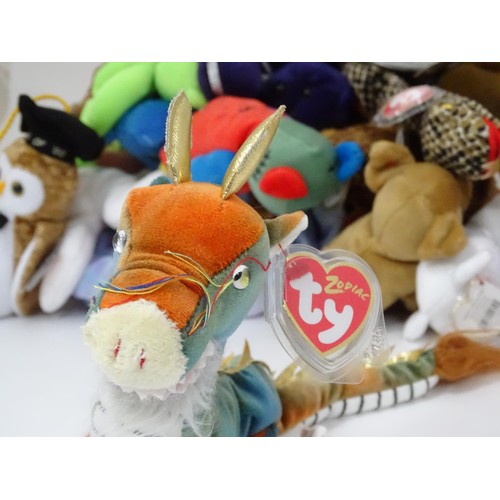 931 - Toys: A quantity of TY Beanie Babies etc. Beanie Babies to include: the Chinese Zodiac Dragon, the Z... 