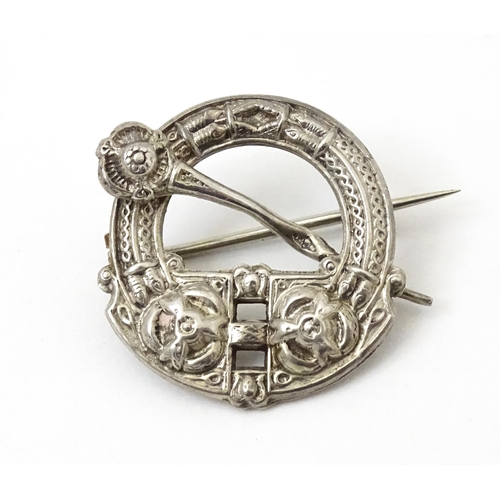 973 - Four items of Scottish jewellery to include a silver brooch with stag detail hallmarked Edinburgh 19... 