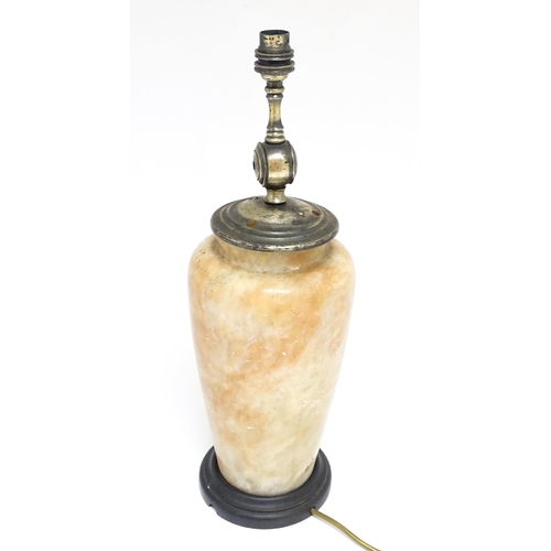 1674 - A 20thC alabaster table lamp of vase form. Approx. 19