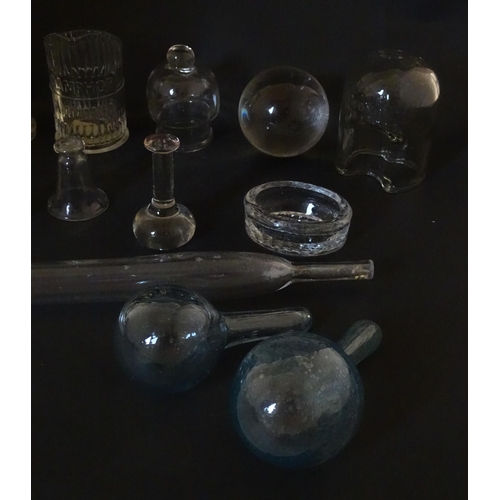 334 - A quantity of assorted scientific / medical glassware and implements, to include vessels, sphere, li... 