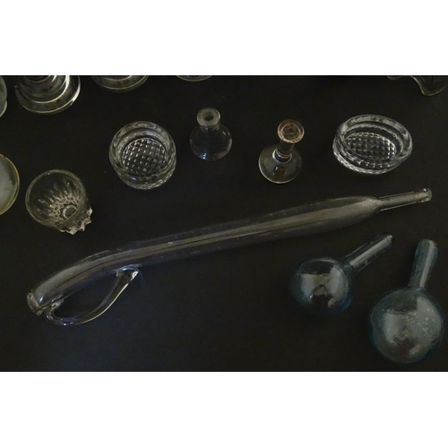 334 - A quantity of assorted scientific / medical glassware and implements, to include vessels, sphere, li... 