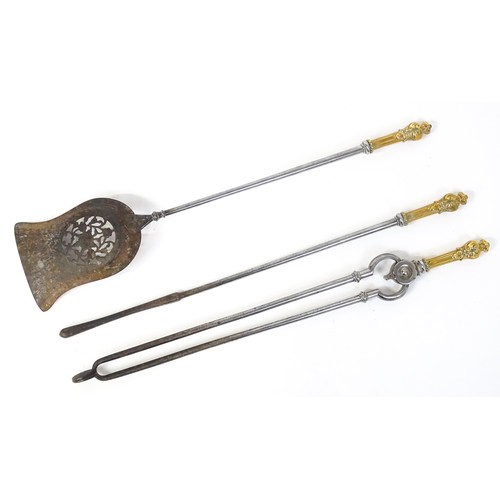 1587A - A 19th set of fire tools, comprising shovel, poker and tongs, each with polished wrought iron shafts... 