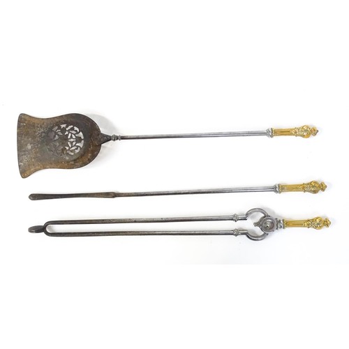 1587A - A 19th set of fire tools, comprising shovel, poker and tongs, each with polished wrought iron shafts... 