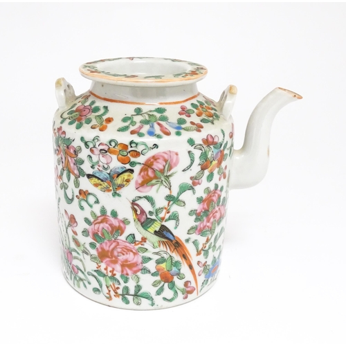 37A - A Chinese Cantonese famille rose teapot decorated with flowers, foliage, birds and butterflies. Appr... 