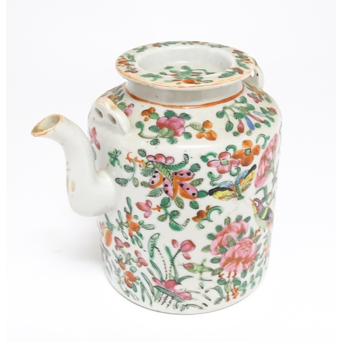 37A - A Chinese Cantonese famille rose teapot decorated with flowers, foliage, birds and butterflies. Appr... 