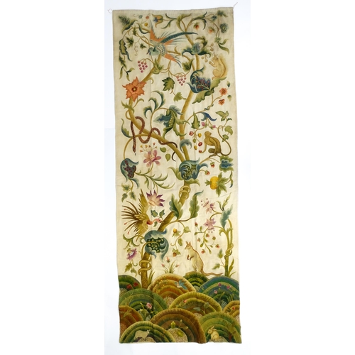 1410 - A large early 20thC Arts & Crafts crewelwork embroidery with tree of life design with flowers, folia... 