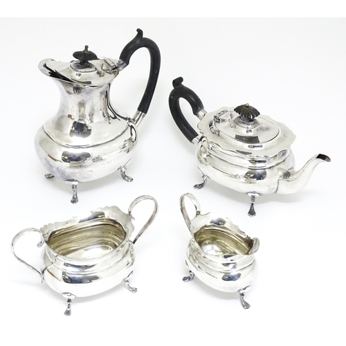 721 - A quantity of silver plated wares to include tea set, fish knives and forks, Christening mug etc.