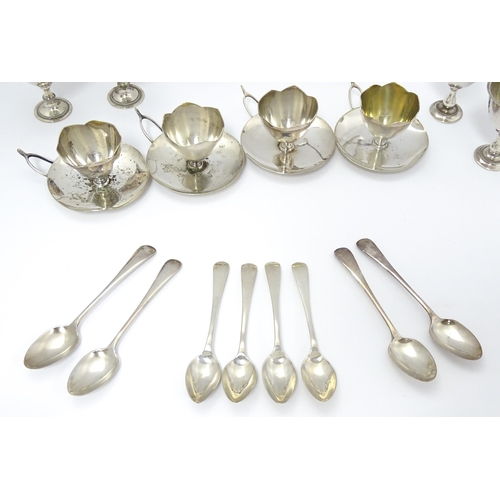 724 - Three assorted silver plate egg cruets, to include one with twin egg cups and toast rack section, an... 