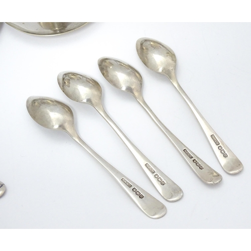 724 - Three assorted silver plate egg cruets, to include one with twin egg cups and toast rack section, an... 