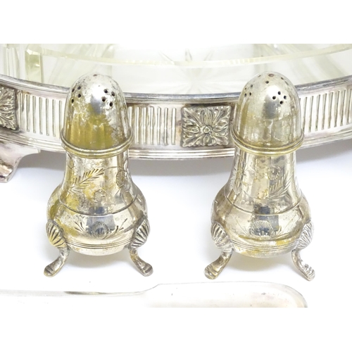 726 - A quantity of assorted silver plated wares to include a claret jug with silver plate mounts by Hukin... 