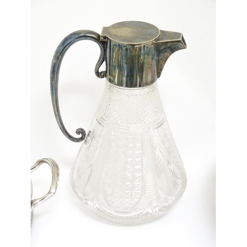 726 - A quantity of assorted silver plated wares to include a claret jug with silver plate mounts by Hukin... 