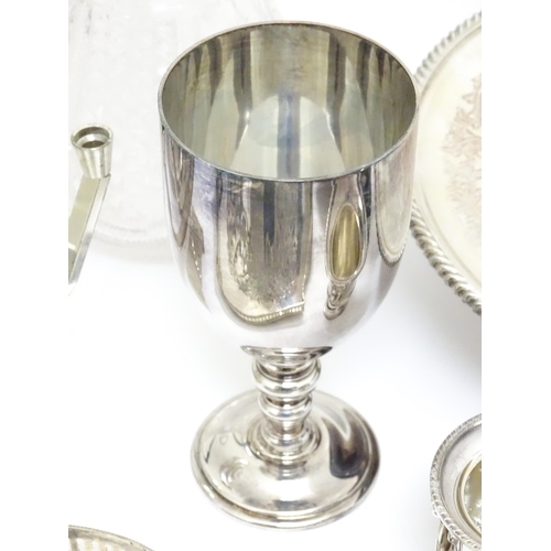 726 - A quantity of assorted silver plated wares to include a claret jug with silver plate mounts by Hukin... 