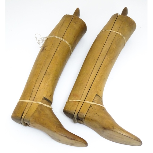 1198 - A pair of oak mid 20thC knee-length boot trees/lasts, approx size 11, 26