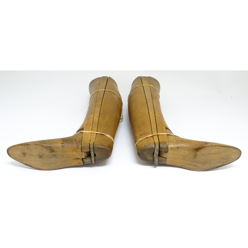 1198 - A pair of oak mid 20thC knee-length boot trees/lasts, approx size 11, 26