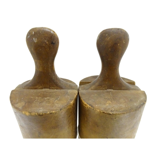 1198 - A pair of oak mid 20thC knee-length boot trees/lasts, approx size 11, 26