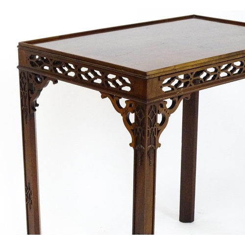 1745 - An 18thC mahogany Chinese Chippendale side table with a rectangular top above a fretwork carved frie... 