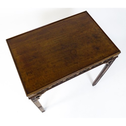 1745 - An 18thC mahogany Chinese Chippendale side table with a rectangular top above a fretwork carved frie... 