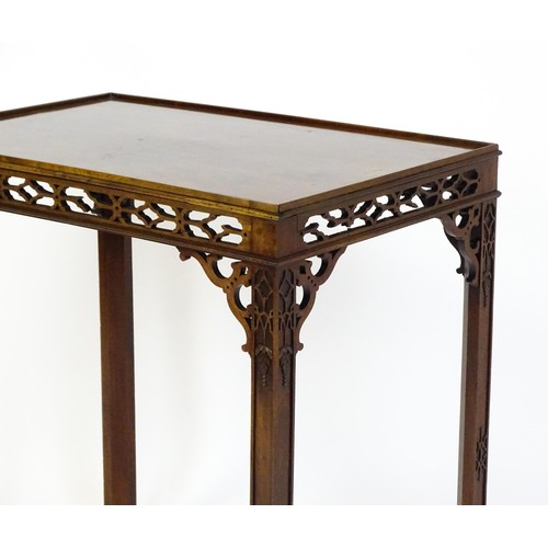 1745 - An 18thC mahogany Chinese Chippendale side table with a rectangular top above a fretwork carved frie... 