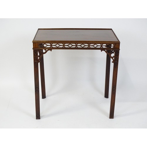 1745 - An 18thC mahogany Chinese Chippendale side table with a rectangular top above a fretwork carved frie... 