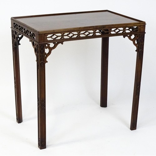 1745 - An 18thC mahogany Chinese Chippendale side table with a rectangular top above a fretwork carved frie... 