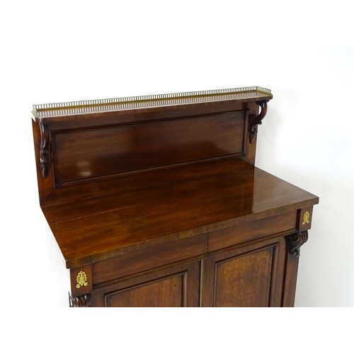 1748 - A 19thC mahogany chiffonier with a brass gallery above scrolled brackets and two short frieze drawer... 