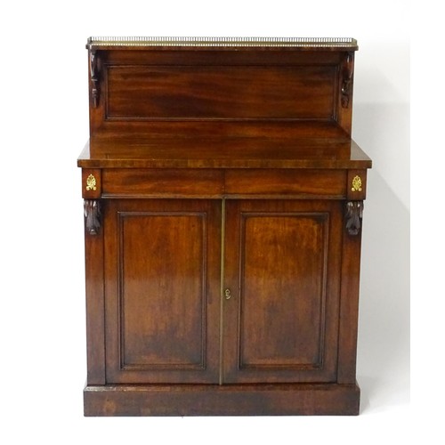 1748 - A 19thC mahogany chiffonier with a brass gallery above scrolled brackets and two short frieze drawer... 