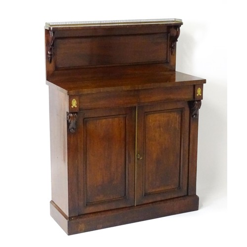 1748 - A 19thC mahogany chiffonier with a brass gallery above scrolled brackets and two short frieze drawer... 