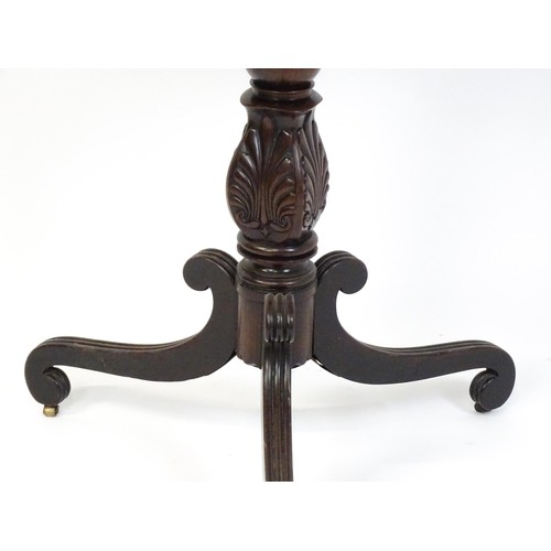 1866 - A 19thC mahogany occasional table with a turned anthemion carved pedestal base raised on three reede... 