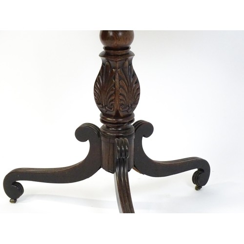 1866 - A 19thC mahogany occasional table with a turned anthemion carved pedestal base raised on three reede... 