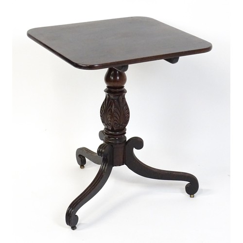 1866 - A 19thC mahogany occasional table with a turned anthemion carved pedestal base raised on three reede... 