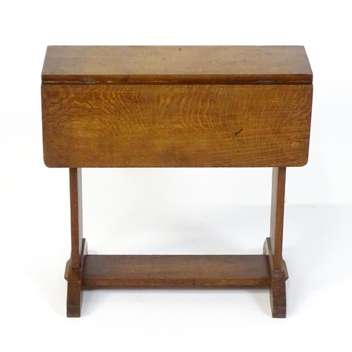 1867 - An early 20thC oak Cotswold school drop flap table. 21