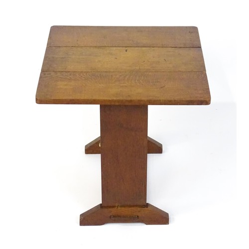 1867 - An early 20thC oak Cotswold school drop flap table. 21