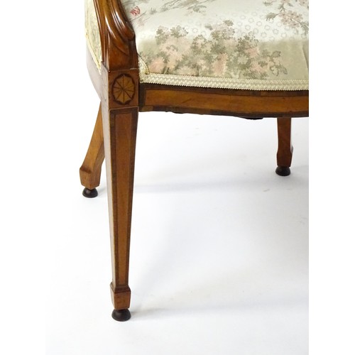 1866A - A late 18thC century Hepplewhite style satinwood library chair with an oval backrest above a sprung ... 