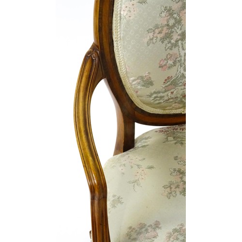 1866A - A late 18thC century Hepplewhite style satinwood library chair with an oval backrest above a sprung ... 