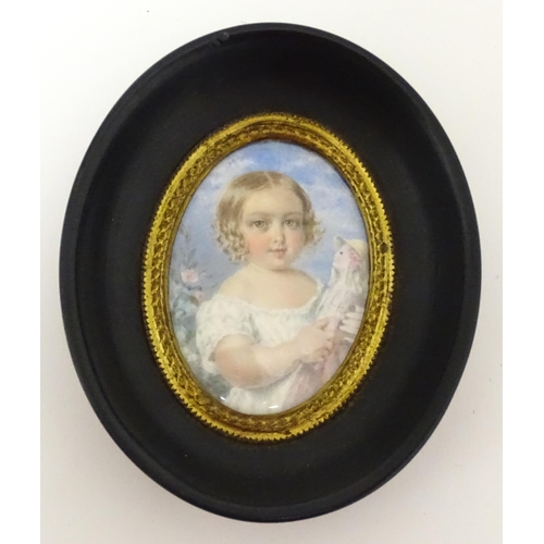 1413 - An Italian watercolour portrait miniature depicting a young girl holding a doll. In the manner of Gu... 