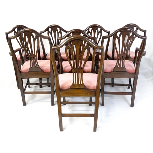 1896 - A set of eight late 19thC / early 20thC Hepplewhite style dining chairs with pierced and carved back... 