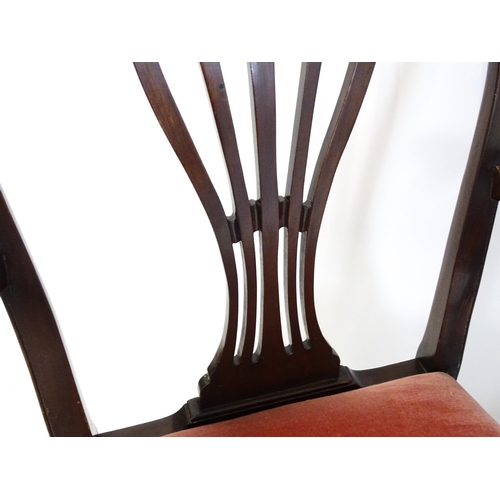 1896 - A set of eight late 19thC / early 20thC Hepplewhite style dining chairs with pierced and carved back... 