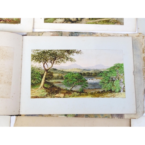 2240 - A 19thC album / sketchbook of watercolours and ink drawings depicting Derbyshire and Welsh views to ... 