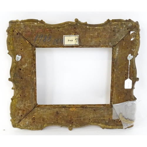 2251 - A 19thC gilt composite frame with swept and pierced detail. Rebate approx. 11 1/4