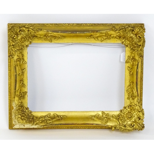 2252 - A 19thC gilt composite frame with swept corners. Rebate approx. 13 1/2