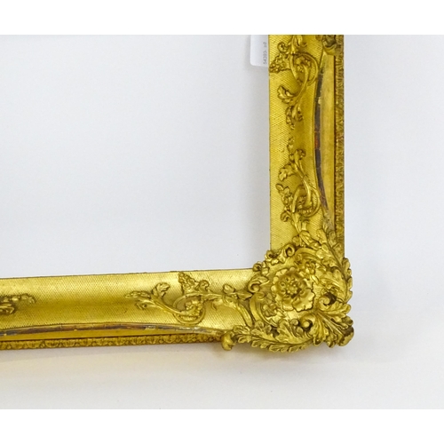 2252 - A 19thC gilt composite frame with swept corners. Rebate approx. 13 1/2