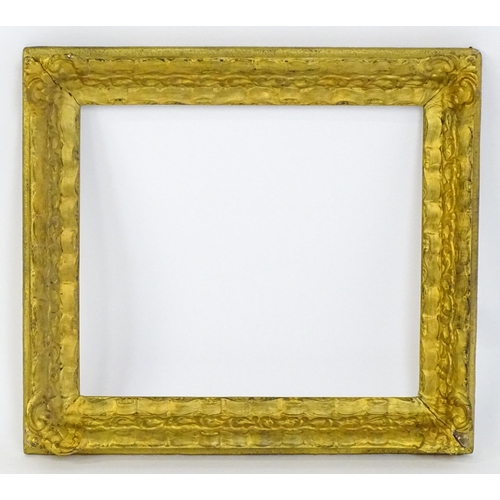 2253 - A 20thC gilt composite frame with foliate and ribbon fold detail. Rebate approx. 15