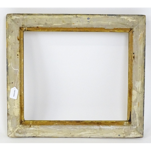 2253 - A 20thC gilt composite frame with foliate and ribbon fold detail. Rebate approx. 15