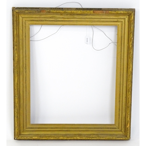 2254 - A 19thC gilt composite frame with banded foliate detail. Rebate approx. 24 3/4